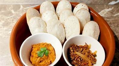 Chitoi Pitha served with vorta