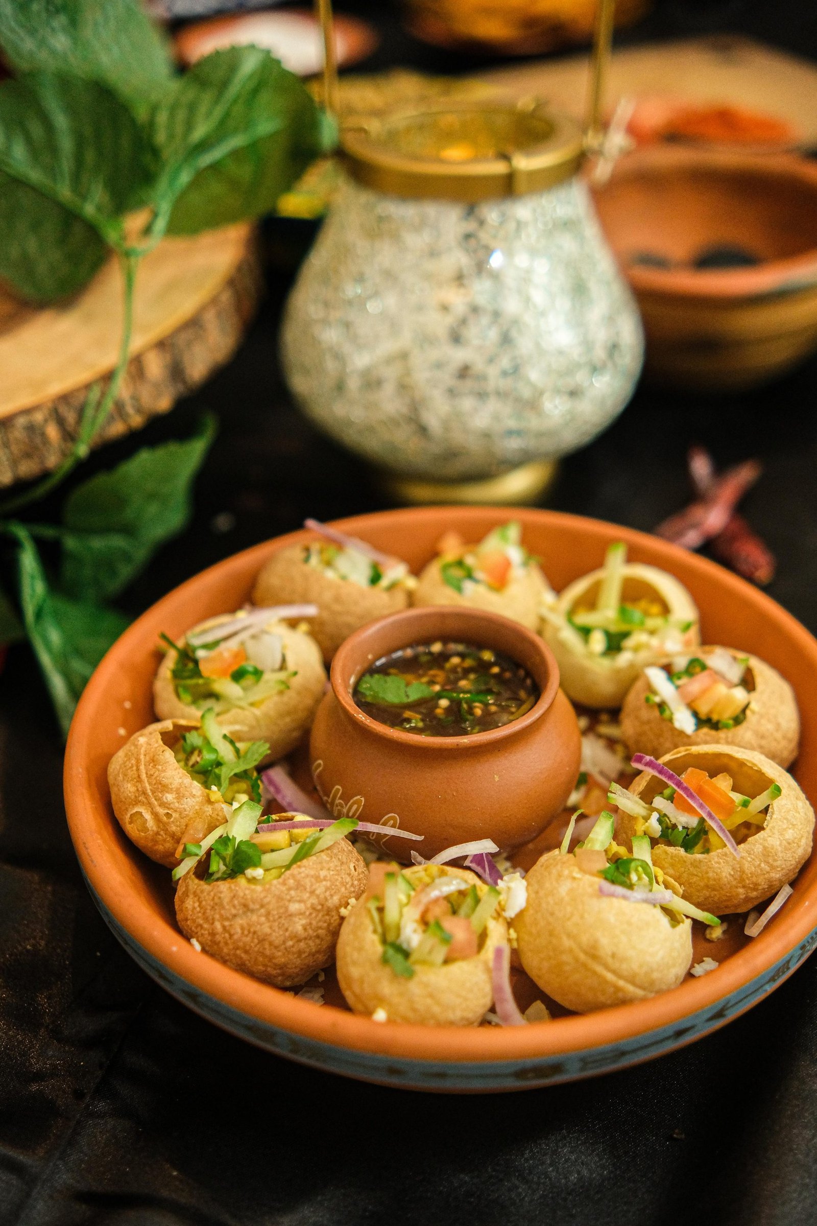 Fushka — crispy shells filled with mashed potato and tangy tamarind water