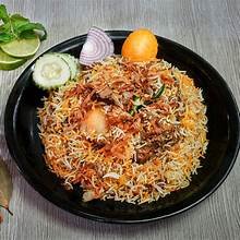 Kacchi biryani, slow-cooked layered rice and meat