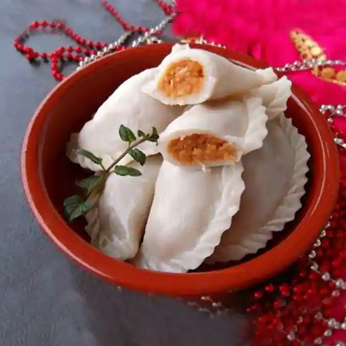 Puli Pitha, filled rice-flour dumplings